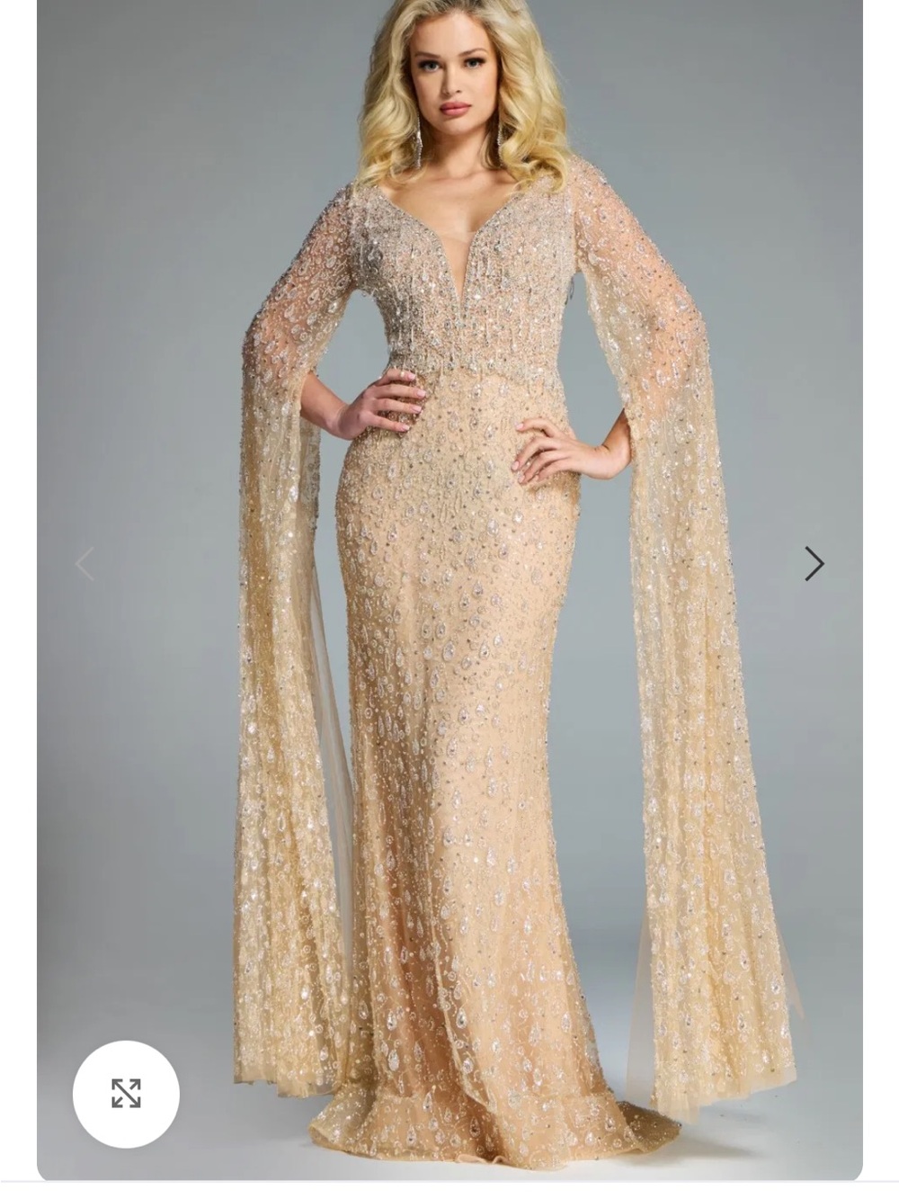 JVN by Jovani Champagne Beige Embellished Maxi Gown with Dramatic Cape Sleeves